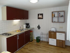 Fridge, stovetop, coffee/tea maker, toaster