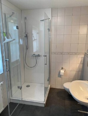 Ducha y secador de pelo