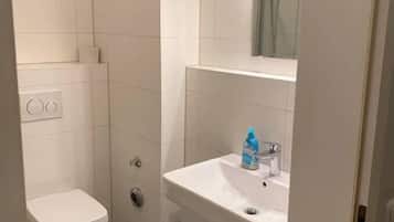 Regadera y secadora de cabello