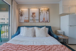 1 habitación, tabla de planchar con plancha y cuna de viaje 