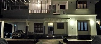 Spacious 4-bedroom house with WiFi, AC in serene Kannur