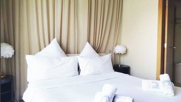 Coffres-forts dans les chambres, fer et planche Ă repasser