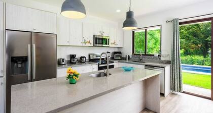 Casa Tuga is a bright 4BR, 4BA home with a private pool (with kid-friendly area), Just a short walk to the beach and restaurants.