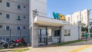 A building with a sign reading "VBA MAR" and a gated entrance. - Apt in Full Condo, St. Faicalville - Vam0504 (Goiânia)