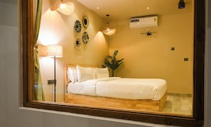 Luxury Room, Pool View | Desk, laptop workspace, free WiFi, bed sheets