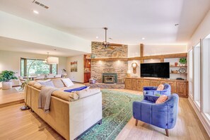 TV, fireplace, books, stereo