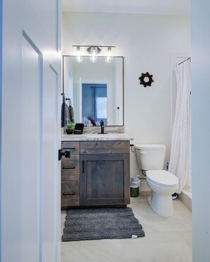 Hair dryer, towels, soap, toilet paper
