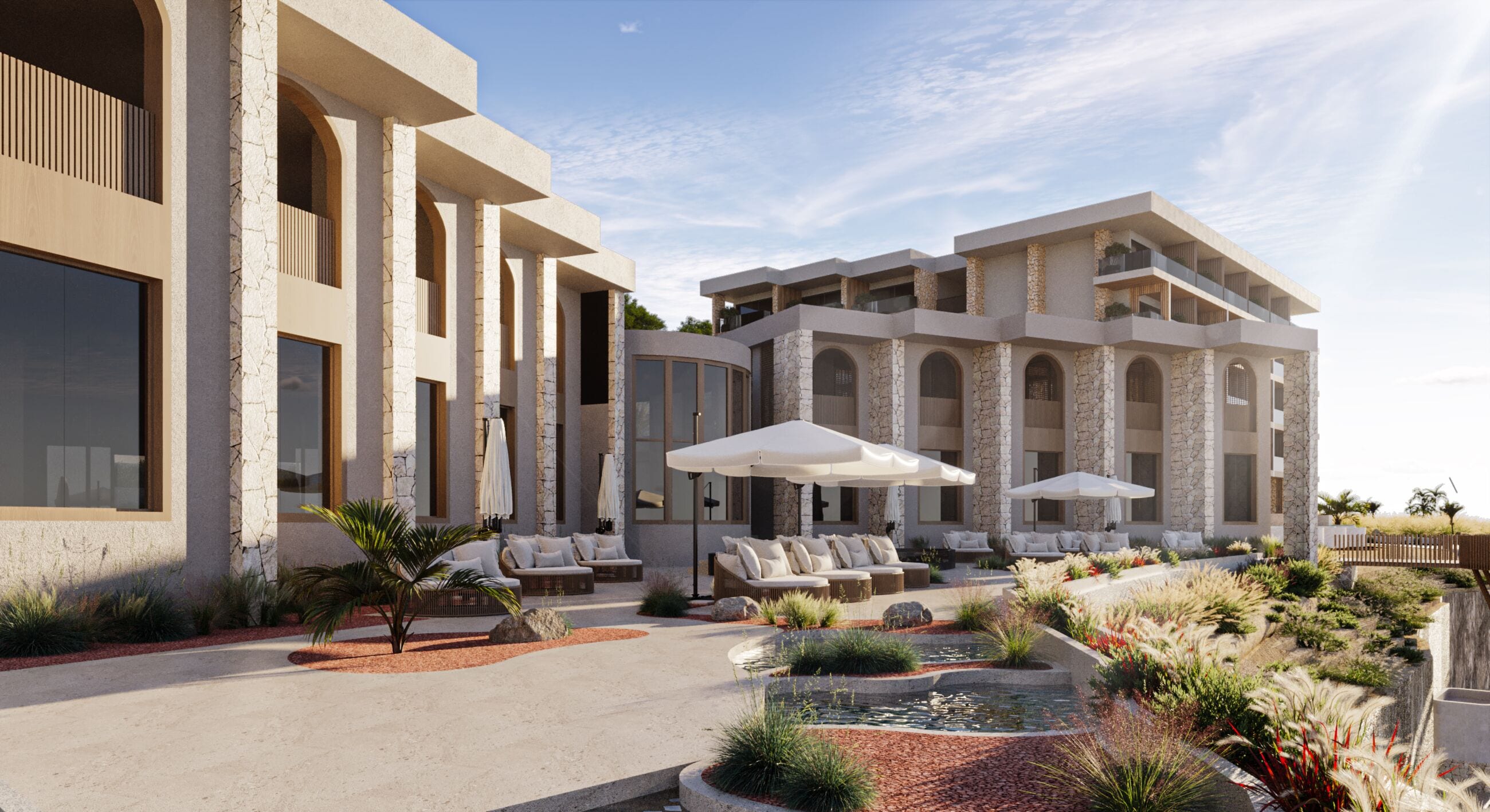 A modern hotel with a courtyard featuring outdoor seating, a small water feature, and a pool.