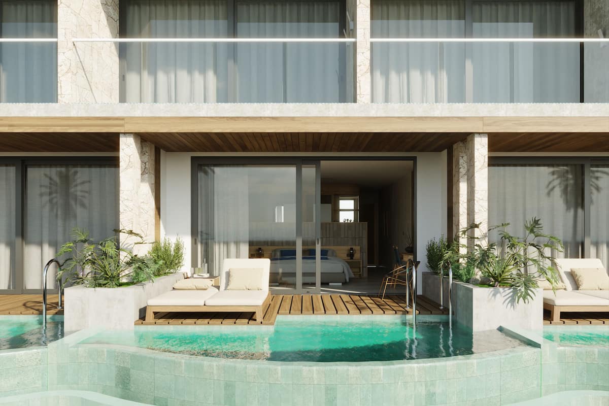 Oceanfront Junior Suite Swim-up | Free minibar, in-room safe, desk, laptop workspace