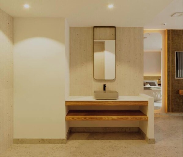 Een douche, een regendouche, gratis toiletartikelen, een haardroger