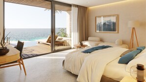 A modern hotel room with a large bed, a desk, and a view of the ocean. - TUI BLUE Curacao All Inclusive (Soto)