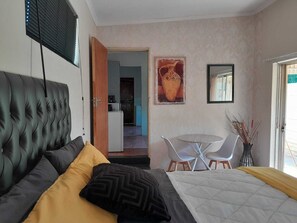 1 habitación, tabla de planchar con plancha, wifi y ropa de cama 