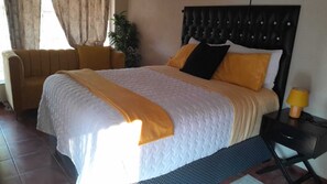 1 habitación, tabla de planchar con plancha, wifi y ropa de cama 