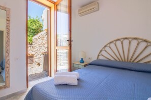 2 bedrooms, iron/ironing board, travel crib