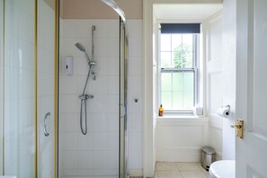 Shower, hair dryer, towels, soap