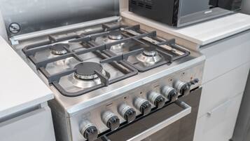 Coffee/tea maker, fridge, microwave, oven