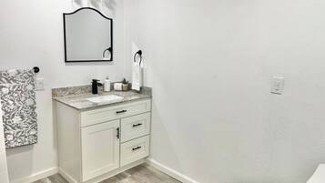 Hair dryer, towels, soap, toilet paper