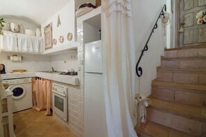 Fridge, stovetop, dishwasher, cookware/dishes/utensils