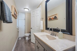 Hair dryer, towels, soap, shampoo