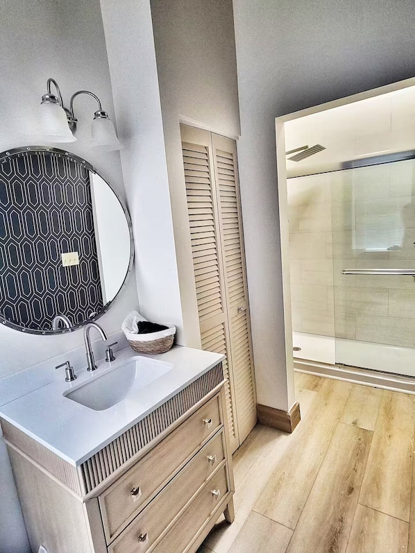 Shower, towels, soap, toilet paper