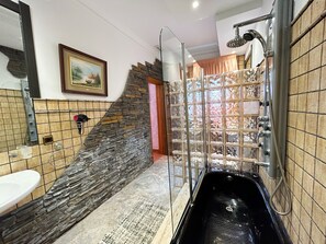 Shower, jetted tub, hair dryer, bidet