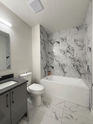 Hair dryer, towels, soap, toilet paper