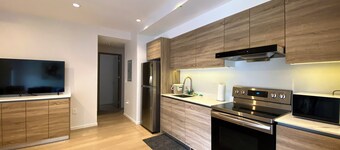 New Central Ambleside Garden suite in We st Van couver