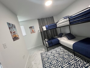 3 bedrooms, desk, iron/ironing board, travel cot