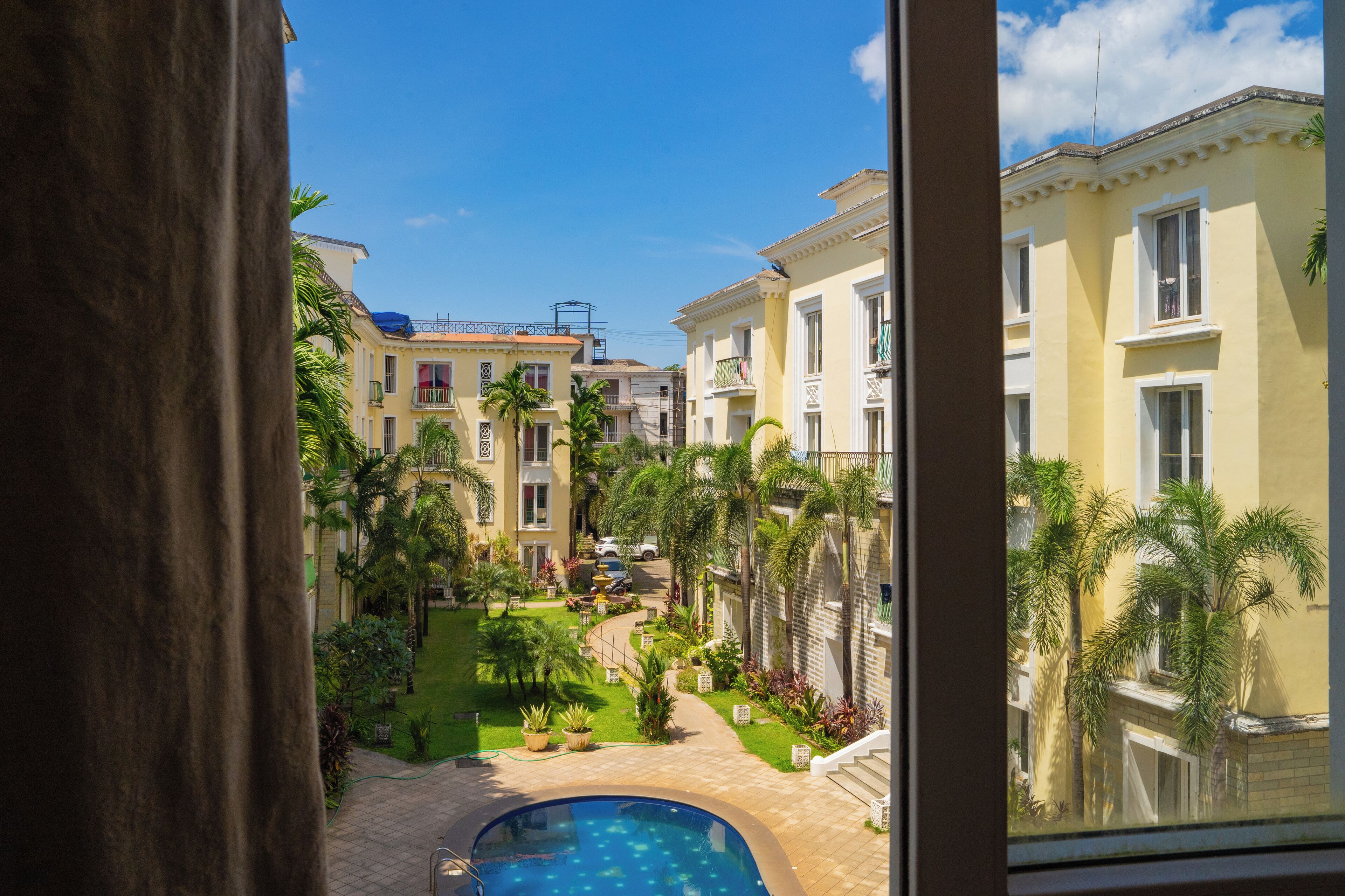 Deluxe Apartment, 2 Bedrooms, Balcony, Pool View | Iron/ironing board, free WiFi