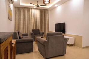Deluxe Apartment, 2 Bedrooms, Balcony, Pool View | Living area - Goan Hideaway - Dos (Arpora)