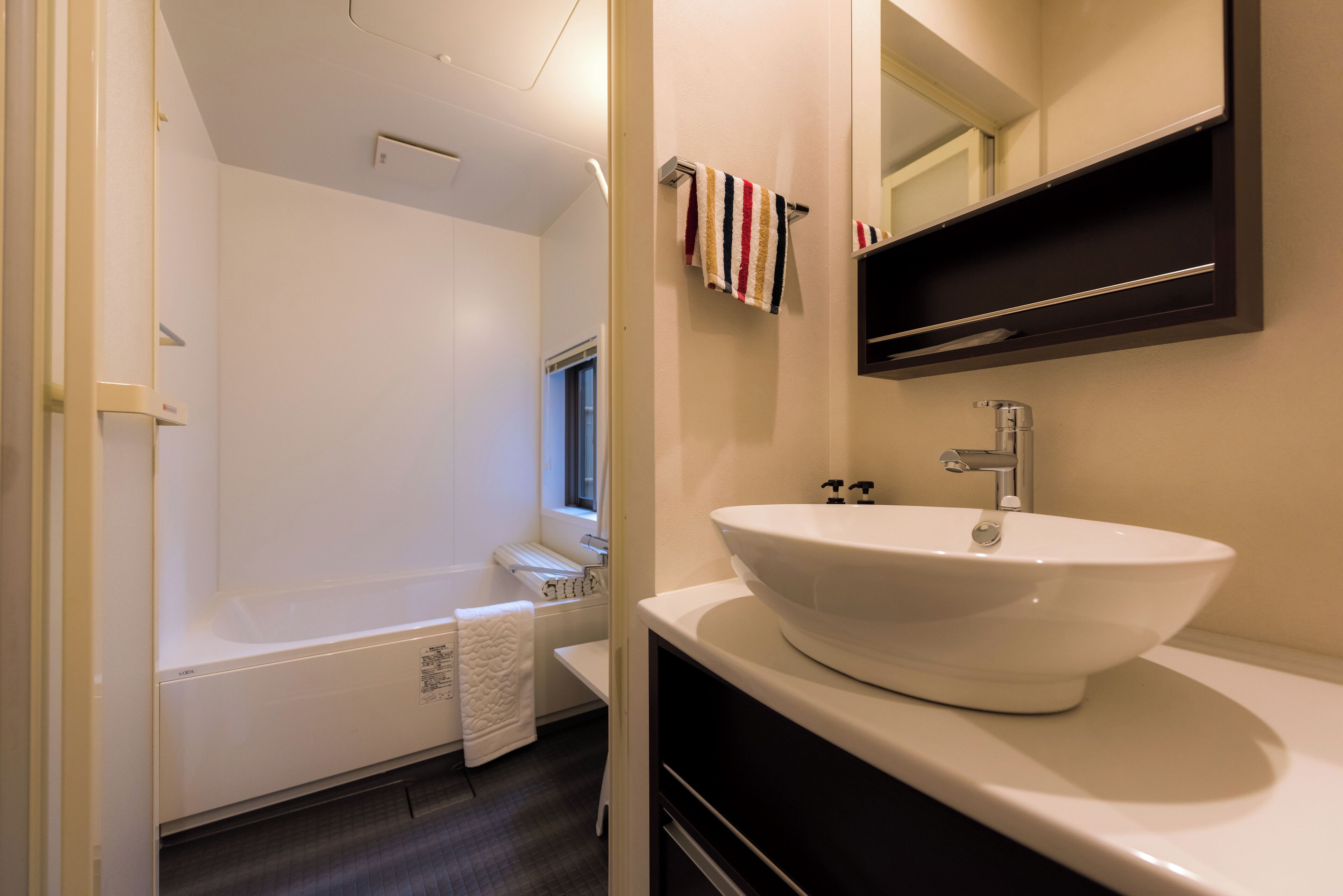 Hair dryer, towels, soap, shampoo