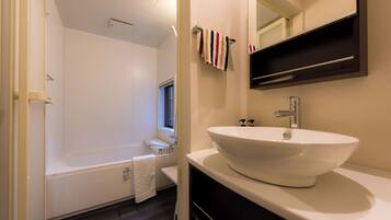 Hair dryer, towels, soap, shampoo