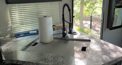 Quaint RV with AC can be picked up in Berrien Springs 29ft a slide out also.