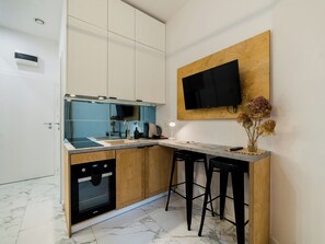 Réfrigérateur, four, plaque de cuisson