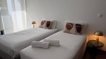 3 bedrooms, desk, iron/ironing board, travel crib