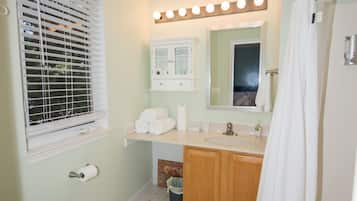 Hair dryer, towels, soap, shampoo