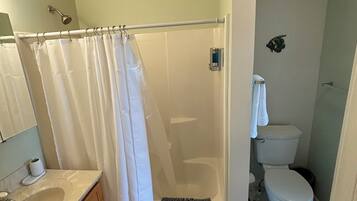 Hair dryer, towels, soap, shampoo