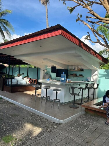 2 Bed with full bath AC, Rooftop and walking distance to beach