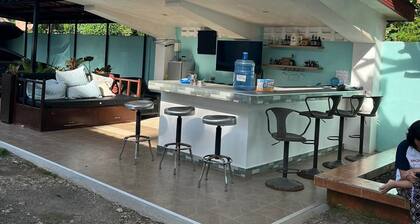 2 Bed with full bath AC, Rooftop and walking distance to beach