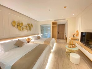 Deluxe Quadruple Room, Balcony, Sea View | Hypo-allergenic bedding, in-room safe, desk, laptop workspace