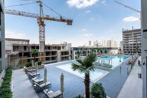 Pool - Beautiful 1 Bed in Binghatti Orchid JVC (Dubai)