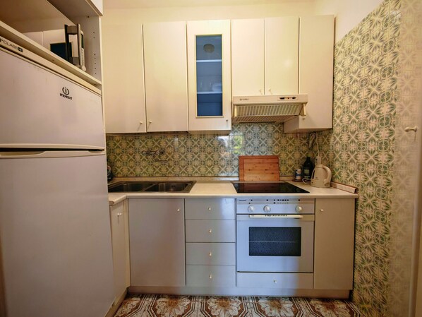 Fridge, microwave, electric kettle, toaster