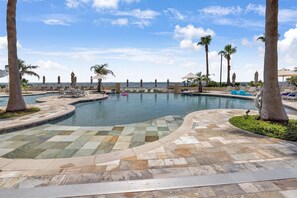 Outdoor pool, a heated pool - Beachfront! Coastal Designer Glam with Resort Amenities. Private Balcony & Grill (Galveston)