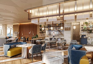 Un hall d’hôtel moderne, doté d’espaces de détente, d’un bar et d’un comptoir d’accueil.