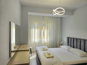 Een strijkplank/strijkijzer, gratis wifi, beddengoed