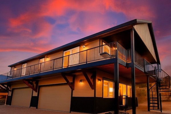 Relax on the balcony and take in unforgettable sunsets