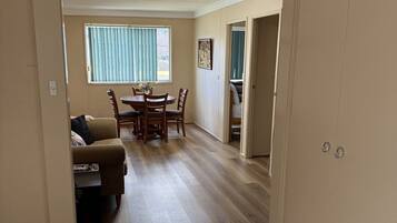 Family Apartment | Living area | 30-cm flat-screen TV with satellite channels
