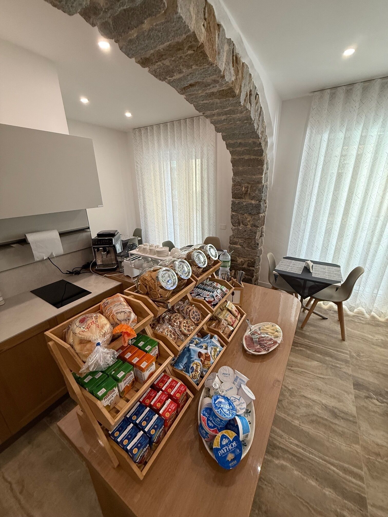A breakfast buffet with various food items and beverages.
