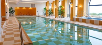 Open plan sea view studio with super king size bed, kitchen, lounge area and a separate bunk room.