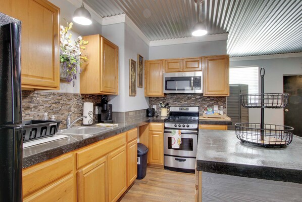 Fridge, microwave, stovetop, coffee/tea maker
